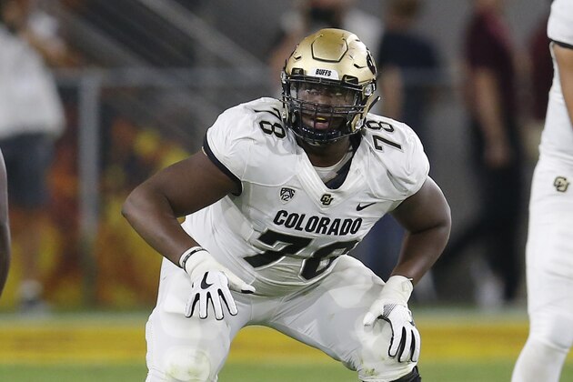 FILE- In this Sept. 21, 2019, file photo, Colorado offensive lineman William Sherman (78) gets set at the line during the first half of an NCAA college football game against Arizona State in Tempe, Ariz. The scouts were there in big numbers. But NFL prospects who were timed and tested, poked and prodded at the pro days didnâ€™t have the usual contingent of underclassmen looking on and offering their support. (AP Photo/Rick Scuteri, File)