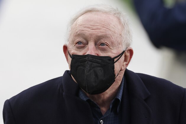 Dallas Cowboys owner Jerry Jones walks off the field before an NFL football game against the New York Giants, Sunday, Jan. 3, 2021, in East Rutherford, N.J. (AP Photo/Adam Hunger)