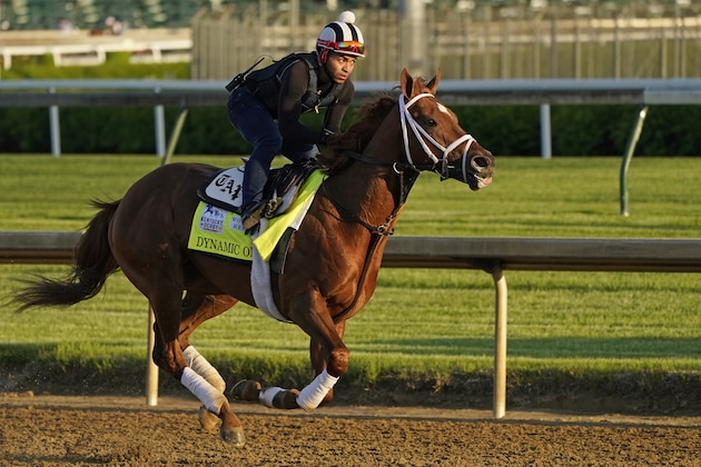 Kentucky Derby hopeful Dynamic One works out at Churchill Downs Tuesday, April 27, 2021, in Louisville, Ky. The 147th running of the Kentucky Derby is scheduled for Saturday, May 1. (AP Photo/Charlie Riedel)