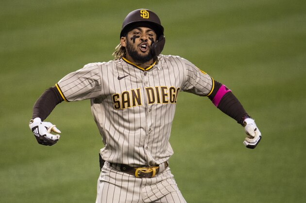 San Diego Padres' Fernando Tatis Jr. celebrates his solo home run during a baseball game against the Los Angeles Dodgers in Los Angeles, Saturday, April 24, 2021. (AP Photo/Kyusung Gong)