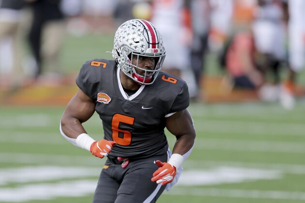 National Team linebacker Justin Hilliard of Ohio State (6) during the first half of the NCAA college football Senior Bowl in Mobile, Ala, Saturday, Jan. 30, 2021. (AP Photo/Rusty Costanza)