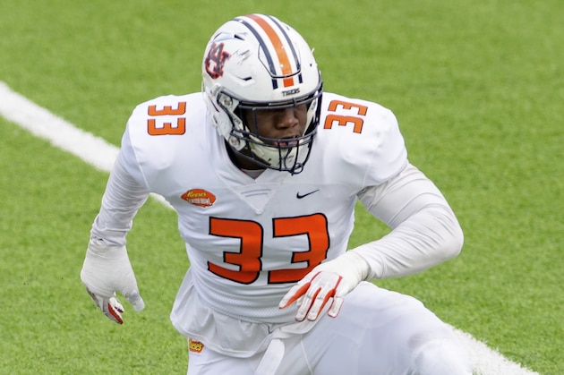 American Team linebacker KJ Britt of Auburn (33) runs during the NCAA Senior Bowl college football game in Mobile, Ala., Saturday, Jan. 30, 2021. (AP Photo/Matthew Hinton) American Team linebacker KJ Britt of Auburn (33) runs during the NCAA Senior Bowl college football game in Mobile, Ala., Saturday, Jan. 30, 2021. (AP Photo/Matthew Hinton)