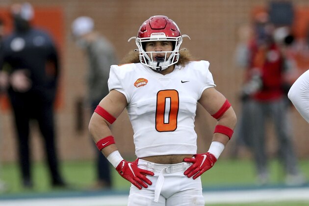 American Team linebacker Grant Stuard of Houston (0) during the second half of the NCAA college football Senior Bowl in Mobile, Ala, Saturday, Jan. 30, 2021. (AP Photo/Rusty Costanza)