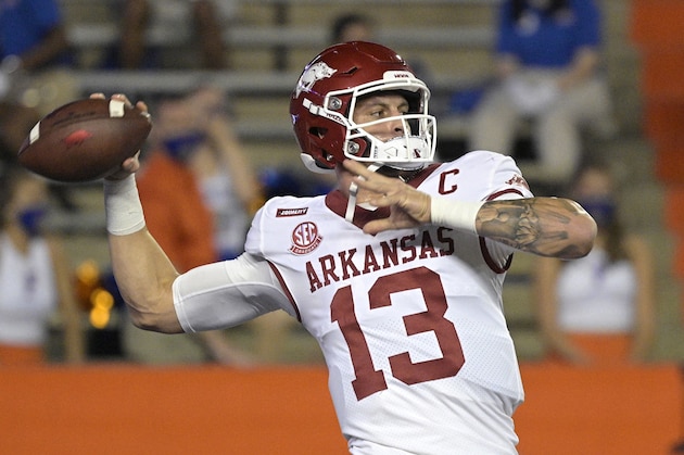 Arkansas quarterback Feleipe Franks (13) throws a pass during warmups before an NCAA college football game against Florida, Saturday, Nov. 14, 2020, in Gainesville, Fla. (AP Photo/Phelan M. Ebenhack)