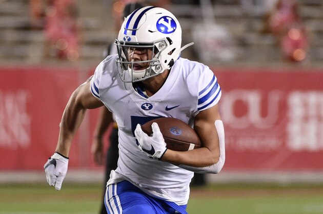 BYU wide receiver Dax Milne runs the ball during the second half of an NCAA college football game against Houston, Friday, Oct. 16, 2020, in Houston. (AP Photo/Eric Christian Smith)