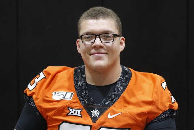 FILE - Oklahoma State offensive lineman Teven Jenkins is pictured during an NCAA college football media day in Stillwater Okla., in this Saturday, Aug. 3, 2019, file photo. Jenkins is a possible first round pick in the NFL Draft, April 29-May 1, 2021, in Cleveland.(AP Photo/Sue Ogrocki, File)