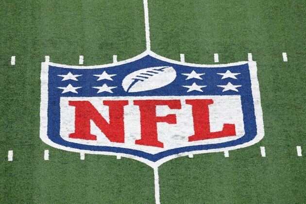FILE - In this Nov. 2, 2020, file photo, the NFL logo is displayed at midfield during an NFL football game between the Tampa Bay Buccaneers and the New York Giants in East Rutherford, N.J. There are some very rich people about to get a whole lot richer. Who else but NFL owners? Probably within the next week, those 32 multi-millionaires/billionaires will see their future earnings increase exponentially. The league is on the verge of extending its broadcast deals with its current partners, and with a new full-time rights holder in Amazon likely acquiring streaming rights. (AP Photo/Adam Hunger, FIle) FILE - In this Nov. 2, 2020, file photo, the NFL logo is displayed at midfield during an NFL football game between the Tampa Bay Buccaneers and the New York Giants in East Rutherford, N.J. There are some very rich people about to get a whole lot richer. Who else but NFL owners? Probably within the next week, those 32 multi-millionaires/billionaires will see their future earnings increase exponentially. The league is on the verge of extending its broadcast deals with its current partners, and with a new full-time rights holder in Amazon likely acquiring streaming rights. (AP Photo/Adam Hunger, FIle)
