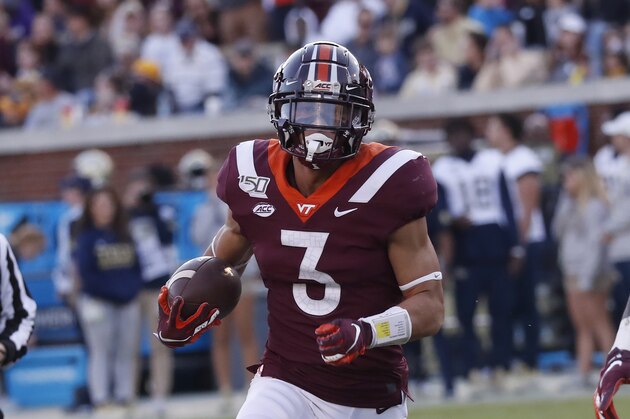 Virginia Tech defensive back Caleb Farley (3) returns an interception for a touchdown in the first half of an NCAA football game against Georgia Tech Saturday, Nov. 16, 2019, in Atlanta. (AP Photo/John Bazemore)