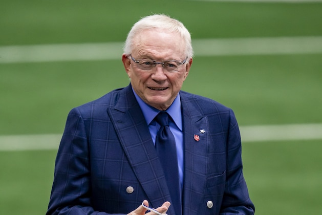 Dallas Cowboys owner Jerry Jones puts on a mask before an NFL football game against the Pittsburgh Steelers, Sunday, Nov. 8, 2020, in Arlington, Texas. Pittsburgh won 24-19. (AP Photo/Brandon Wade)