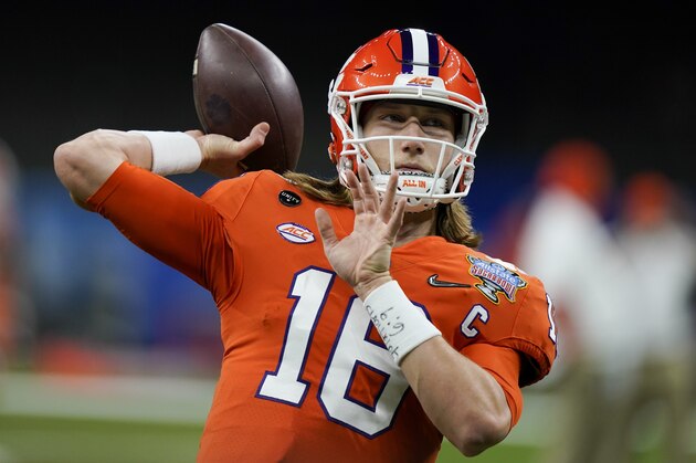 Clemson quarterback Trevor Lawrence warms up before the Sugar Bowl NCAA college football game against Ohio State Friday, Jan. 1, 2021, in New Orleans. (AP Photo/Gerald Herbert)