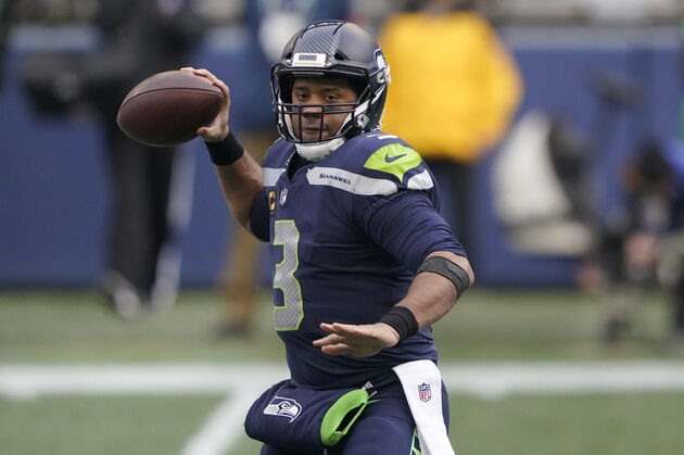 Seattle Seahawks quarterback Russell Wilson (3) in action against the Los Angeles Rams during an NFL wild-card playoff football game, Saturday, Jan. 9, 2021, in Seattle. (AP Photo/Ted S. Warren)