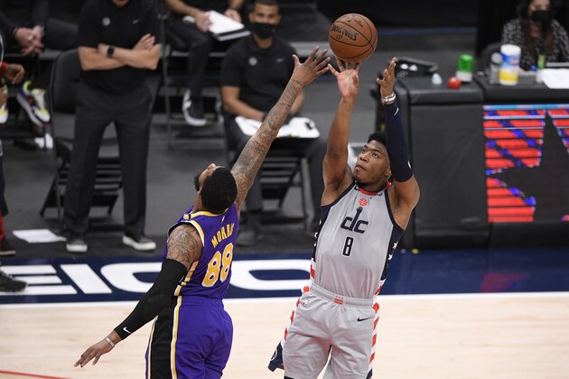 Washington Wizards forward Rui Hachimura (8) shoots against Los Angeles Lakers forward Markieff Morris (88) during the first half of an NBA basketball game, Wednesday, April 28, 2021, in Washington. (AP Photo/Nick Wass)
