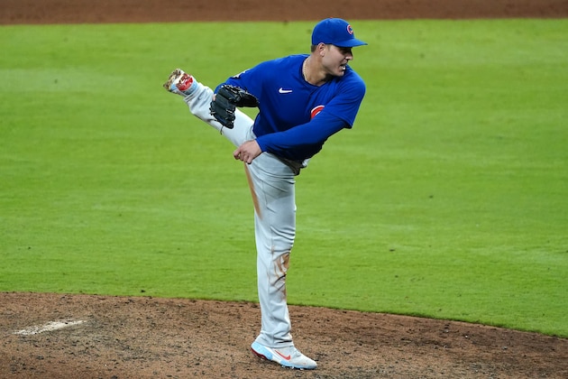 Chicago Cubs first baseman Anthony Rizzo (44) works as a relief pitcher in the seventh inning of a baseball game against the Atlanta Braves Wednesday, April 28, 2021, in Atlanta. (AP Photo/John Bazemore)