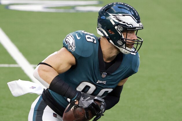 FILE - In this Dec. 27, 2020, file photo, Philadelphia Eagles tight end Zach Ertz catches a pass prior to an NFL football game in Arlington, Texas. Even during a pandemic with ticket sales limited and the off-the-field events drastically scaled back, an event like the Super Bowl also brings with it a heightened risk of human trafficking. Ertz is among a handful of NFL players whoâ€™ve joined the cause to help fight such atrocities. (AP Photo/Michael Ainsworth, File)