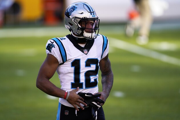 Carolina Panthers wide receiver D.J. Moore warms up prior to an NFL football game between the Carolina Panthers and the Washington Football Team, Sunday, Dec. 27, 2020, in Landover, Md. (AP Photo/Mark Tenally)
