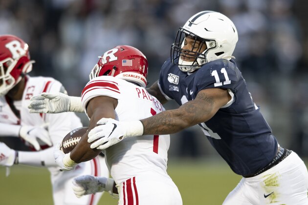 FILE - In this Nov. 30, 2019, file photo, Penn State linebacker Micah Parsons (11) tackles Rutgers tight end Johnathan Lewis (11) in the first quarter of an NCAA college football game, in State College, Pa. Andre Odom joined Athletes First as an agent two years ago and later this month two of his clients — Kyle Pitts and Micah Parsons — could be picked in the top 10 of the NFL draft. (AP Photo/Barry Reeger, File)