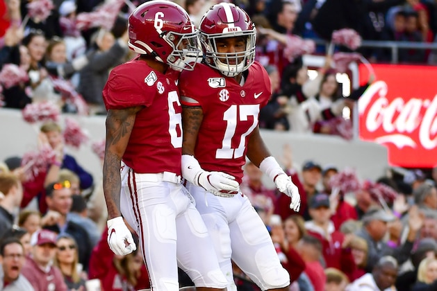 Alabama wide receiver DeVonta Smith (6) and Alabama wide receiver Jaylen Waddle (17) celebrate Smith's touchdown against LSU in the first half of an NCAA football game Saturday, Nov. 9, 2019, in Tuscaloosa, Ala. (AP Photo/Vasha Hunt)
