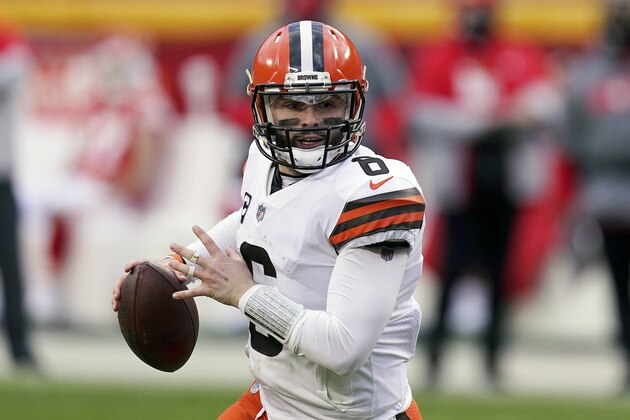 FILE - Cleveland Browns quarterback Baker Mayfield throws during the second half of an NFL divisional round football game against the Kansas City Chiefs in Kansas City, Mo., in this Sunday, Jan. 17, 2021, file photo. The Browns exercised the fifth-year option on quarterback Baker Mayfield's rookie contract, an expected move after his strong 2020 season. (AP Photo/Charlie Riedel, File)