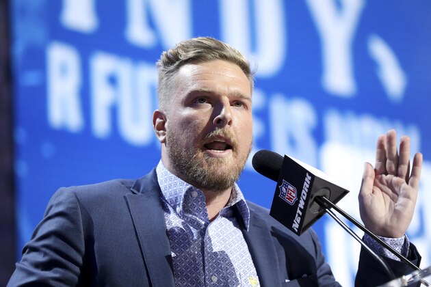 FILE - In this April 26, 2019, file photo, Former Indianapolis Colts player Pat McAfee announces the Colts' third round pick at the NFL football draft, in Nashville, Tenn. The former Indianapolis Colts punter had his  talk show debut Monday morning, Sept. 9, 2019, on DAZN in the U.S. and Canada as well as Westwood One radio in 40 cities. This is in addition to calling Thursday night college football. (AP Photo/Gregory Payan, File)