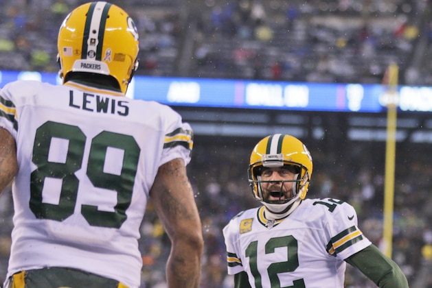 Green Bay Packers quarterback Aaron Rodgers, right, celebrates his touchdown with tight end Marcedes Lewis during the second half of an NFL football game against the New York Giants, Sunday, Dec. 1, 2019, in East Rutherford, N.J. (AP Photo/Adam Hunger)
