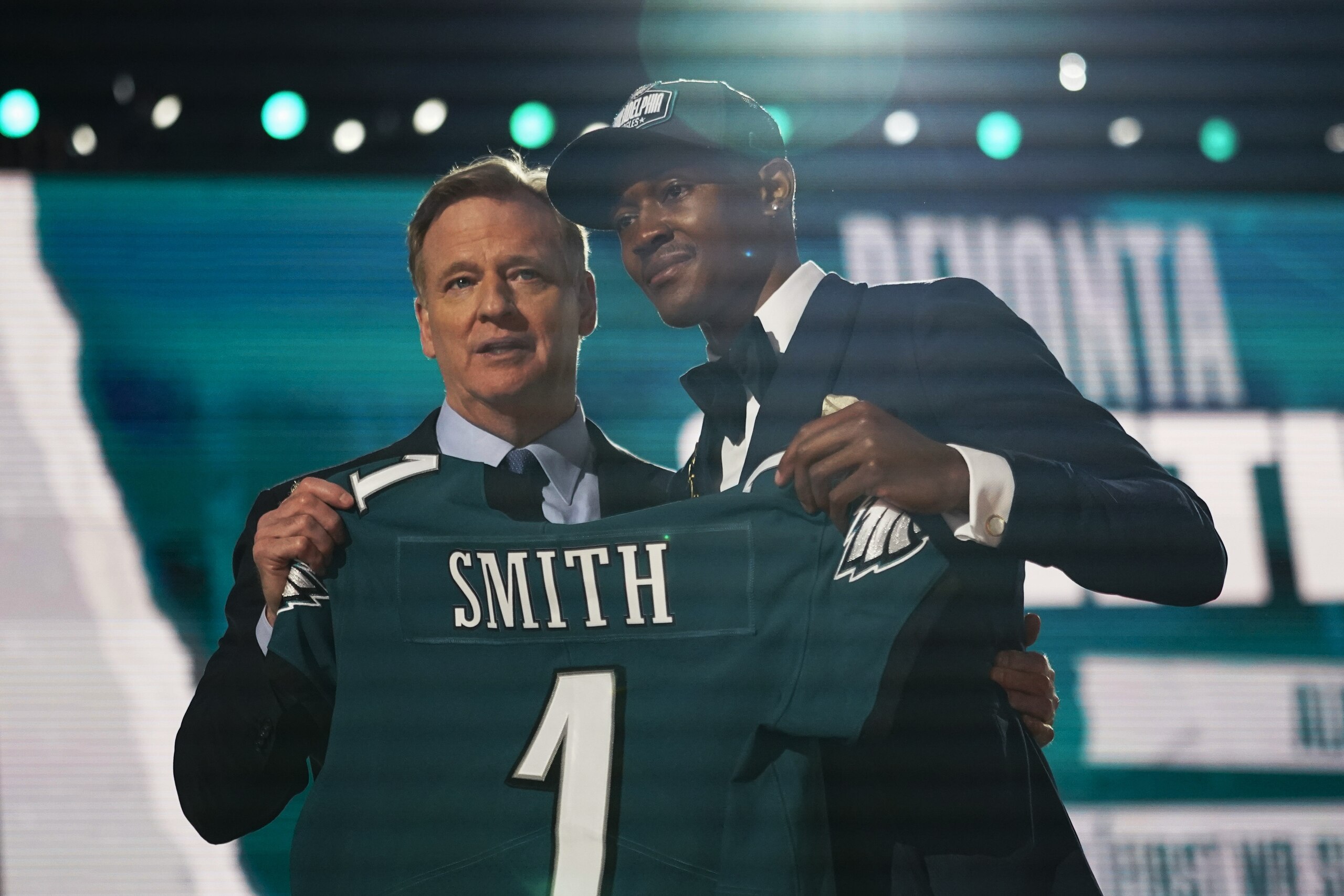 Alabama wide receiver DeVonta Smith, right, holds a team jersey with NFL Commissioner Roger Goodell after he was chosen by the Philadelphia Eagles with the 10th pick in the first round of the NFL football draft Thursday, April 29, 2021, in Cleveland. (AP Photo/Tony Dejak) Alabama wide receiver DeVonta Smith, right, holds a team jersey with NFL Commissioner Roger Goodell after he was chosen by the Philadelphia Eagles with the 10th pick in the first round of the NFL football draft Thursday, April 29, 2021, in Cleveland. (AP Photo/Tony Dejak)