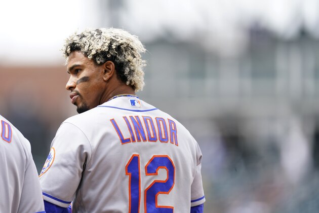 New York Mets' Francisco Lindor reacts after flying out against Colorado Rockies starting pitcher Antonio Senzatela in the third inning of a baseball game Sunday, April 18, 2021, in Denver. (AP Photo/David Zalubowski)