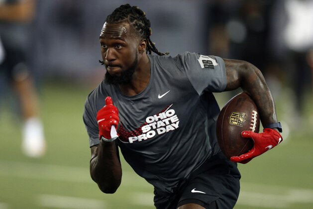Ohio State running back Trey Sermon runs through a drill during an NFL Pro Day at Ohio State University on Tuesday, March 30, 2021, in Columbus, Ohio. (AP Photo/Paul Vernon)