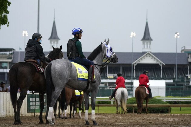 Kentucky Derby entrant Essential Quality waits to work out at Churchill Downs Thursday, April 29, 2021, in Louisville, Ky. The 147th running of the Kentucky Derby is scheduled for Saturday, May 1. (AP Photo/Charlie Riedel)