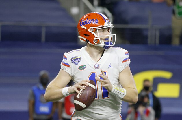 Florida quarterback Kyle Trask (11) throws the ball during the Cotton Bowl NCAA college football game in Arlington, Texas, Wednesday, Dec. 30, 2020. (AP Photo/Michael Ainsworth)