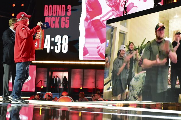 An image of Oklahoma center Creed Humphrey is displayed on a screen after a second-round pick by the Kansas City Chiefs at the NFL football draft Friday, April 30, 2021, in Cleveland. (AP Photo/David Dermer)