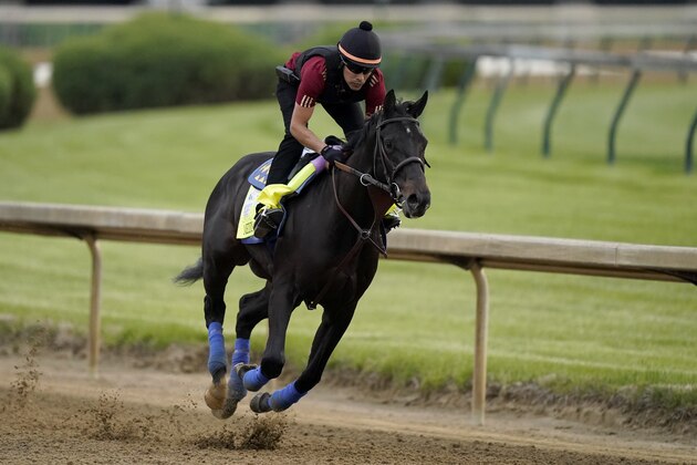 Kentucky Derby entrant Medina Spirit works out Churchill Downs Wednesday, April 28, 2021, in Louisville, Ky. The 147th running of the Kentucky Derby is scheduled for Saturday, May 1. (AP Photo/Charlie Riedel)