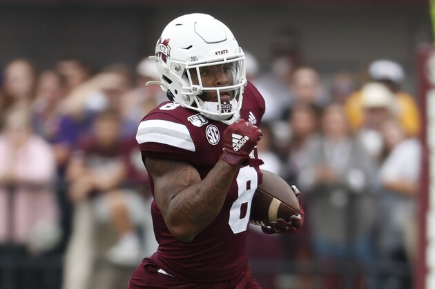Mississippi State running back Kylin Hill (8) runs for short yardage against LSU during the first half of their NCAA college football game in Starkville, Miss., Saturday, Oct. 19, 2019. LSU won 36-13. (AP Photo/Rogelio V. Solis)