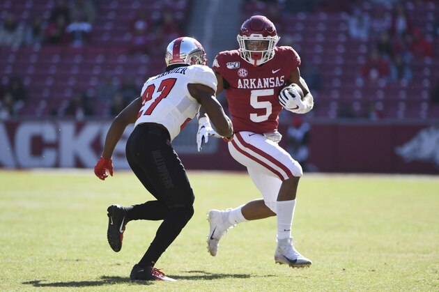 FILE - In this Nov. 9, 2019, file photo, Arkansas running back Rakeem Boyd carries against Western Kentucky during the second half of an NCAA college football game in Fayetteville, Ark. After a promising 2018, Boyd was a breakout star in the Southeastern Conference with 1,133 yards rushing and eight touchdowns last season.   (AP Photo/Michael Woods, File)