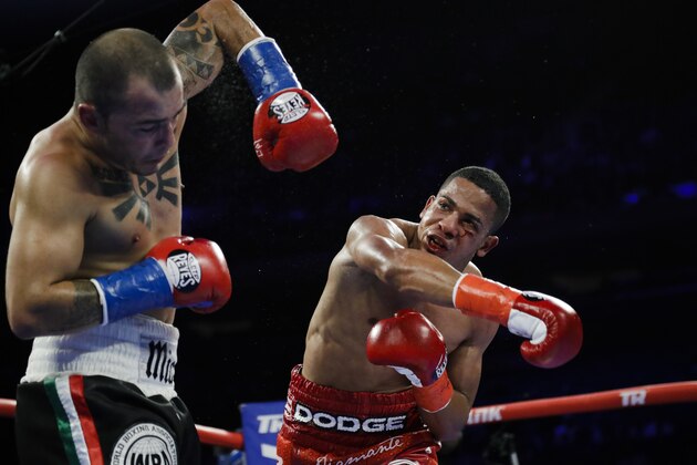 Puerto Rico's Felix Verdejo, right, punches Costa Rica's Bryan Vazquez during the fifth round of a lightweight boxing match Saturday, April 20, 2019, in New York. Verdejo won the fight. (AP Photo/Frank Franklin II)