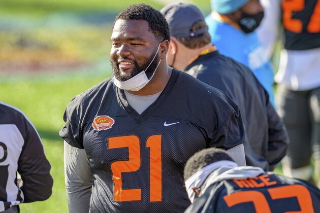 American Team defensive lineman Marvin Wilson of Florida State (21) watches during the American Team practice for the NCAA Senior Bowl college football game in Mobile, Ala., Thursday, Jan. 28, 2021. (AP Photo/Matthew Hinton)