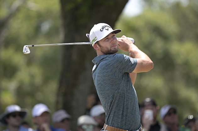 Sam Burns watches his tee shot on the second hole during the final round of the Valspar Championship golf tournament, Sunday, May 2, 2021, in Palm Harbor, Fla. (AP Photo/Phelan M. Ebenhack)