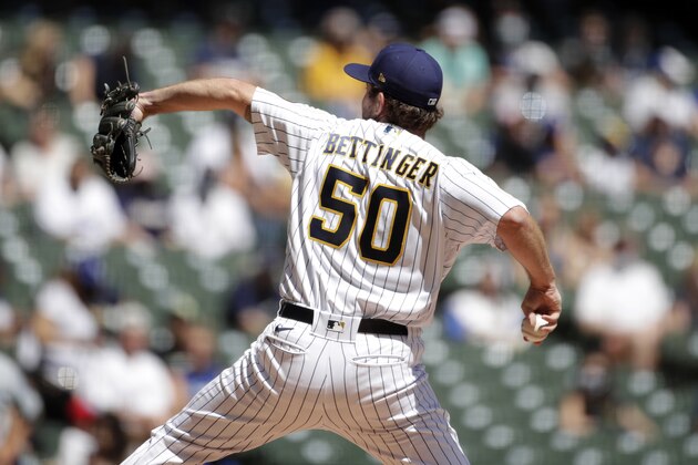 Milwaukee Brewers' Alec Bettinger pitches during the first inning of a baseball game against the Los Angeles Dodgers Sunday, May 2, 2021, in Milwaukee. (AP Photo/Aaron Gash)