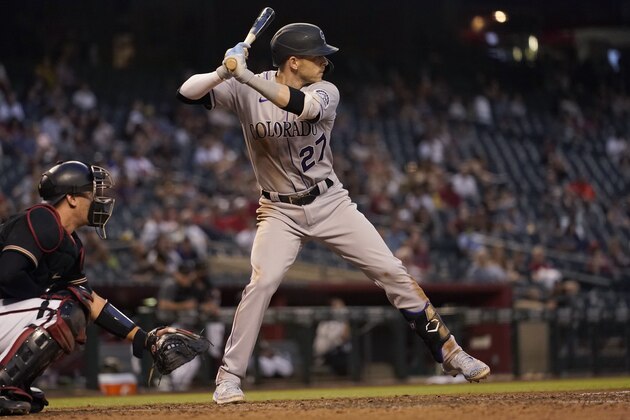 Colorado Rockies' Trevor Story (27) against the Arizona Diamondbacks during a baseball game, Saturday, May 1, 2021, in Phoenix. (AP Photo/Matt York)