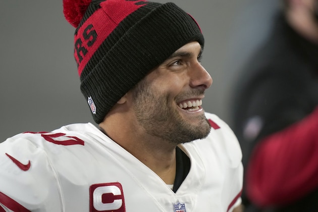 San Francisco 49ers quarterback Jimmy Garoppolo smiles after defeating the New England Patriots in an NFL football game, Sunday, Oct. 25, 2020, in Foxborough, Mass. (AP Photo/Steven Senne)