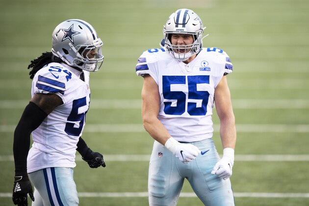 Dallas Cowboys middle linebacker Jaylon Smith (54) and outside linebacker Leighton Vander Esch (55) react during an NFL football game against the Cincinnati Bengals, Sunday, Dec. 13, 2020, in Cincinnati. (AP Photo/Emilee Chinn)