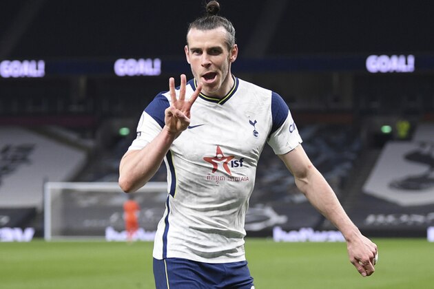 Tottenham's Gareth Bale celebrates after scoring his side's third goal during the English Premier League soccer match between Tottenham and Sheffield United, at the Tottenham Hotspur Stadium in London, Sunday, May 2, 2021. (Shaun Botterill/Pool via AP)