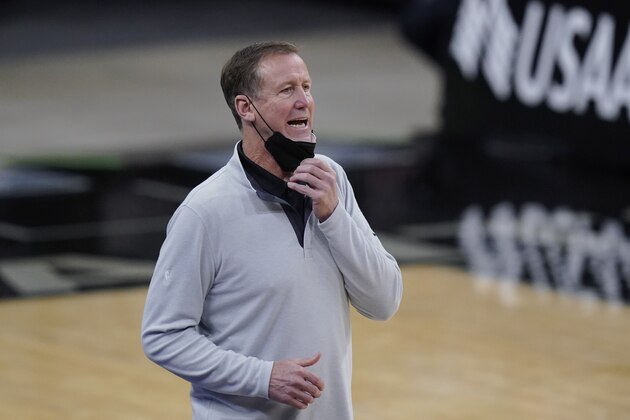 Portland Trail Blazers head coach Terry Stotts talks to his players during the first half of an NBA basketball game against the San Antonio Spurs in San Antonio, Friday, April 16, 2021. (AP Photo/Eric Gay)