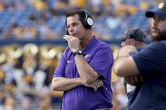 James Madison head coach Curt Cignetti looks at the scoreboard during the second half of an NCAA college football game against West Virginia Saturday, Aug. 31, 2019, in Morgantown, W.Va. (AP Photo/Raymond Thompson)