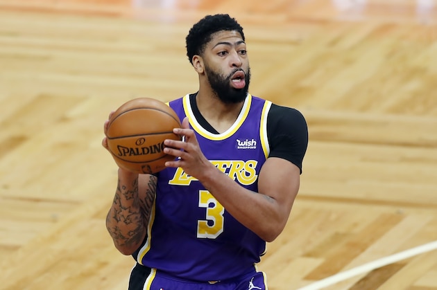 Los Angeles Lakers' Anthony Davis plays against the Boston Celtics during the first half of an NBA basketball game, Saturday, Jan. 30, 2021, in Boston. (AP Photo/Michael Dwyer)
