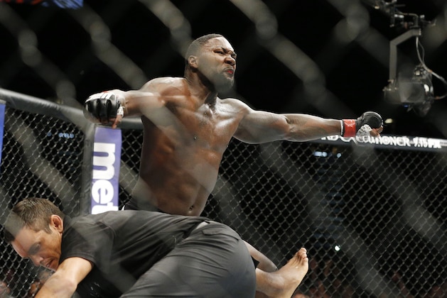 Anthony Johnson celebrates after defeating Jimi Manuwa during their light heavyweight mixed martial arts bout at UFC 191 on Saturday, Sept. 5, 2015, in Las Vegas. (AP Photo/John Locher)