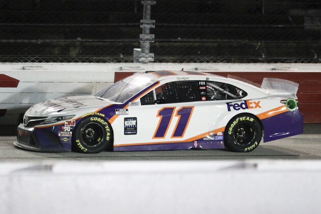 Denny Hamlin (11) drives during the NASCAR Cup Series auto race Wednesday, May 20, 2020, in Darlington, S.C. Hamlin won the race shortened by rain. (AP Photo/Brynn Anderson)
