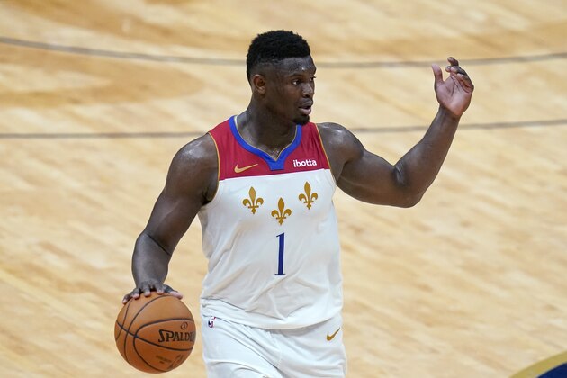 New Orleans Pelicans forward Zion Williamson (1) moves the ball up court in the second half of an NBA basketball game against the Golden State Warriors in New Orleans, Tuesday, May 4, 2021. (AP Photo/Gerald Herbert)