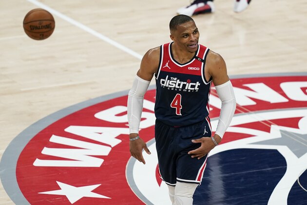 Washington Wizards guard Russell Westbrook (4) reacts during a break in the second half of a basketball game against the Indiana Pacers, Monday, May 3, 2021, in Washington. (AP Photo/Alex Brandon)