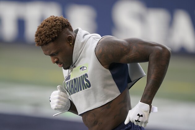 Seattle Seahawks wide receiver DK Metcalf warms-up before an NFL wild-card playoff football game against the Los Angeles Rams, Saturday, Jan. 9, 2021, in Seattle. (AP Photo/Ted S. Warren)