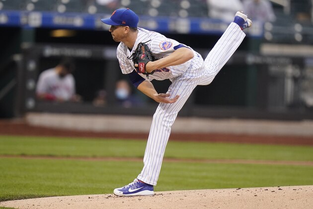 New York Mets' Jacob deGrom delivers a pitch during the first inning of a baseball game against the Boston Red Sox Wednesday, April 28, 2021, in New York. (AP Photo/Frank Franklin II)